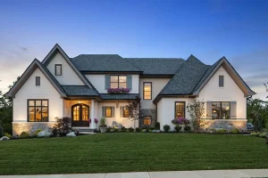 Architectural outdoor lighting design highlighting a modern Cincinnati home with balanced facade and landscape lighting