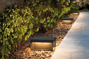 Low-voltage pathway lighting installed along a landscaped walkway in Northern Kentucky, showing energy-efficient outdoor lighting for winter safety and curb appeal.