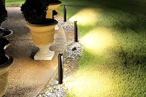 LED pathway lighting installation in Cincinnati highlighting walkway, planters, and lawn for safer nighttime visibility and improved curb appeal
