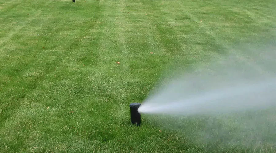 In a green lawn, installed sprinkler system winterization and blowout near Cincinnati,OH