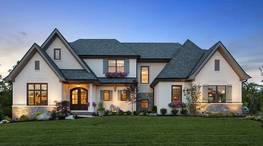 Architectural outdoor lighting design highlighting a modern Cincinnati home with balanced facade and landscape lighting