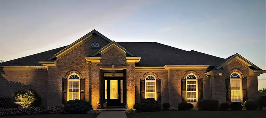 In a house, outdoor lighting installed by Expert Irrigation